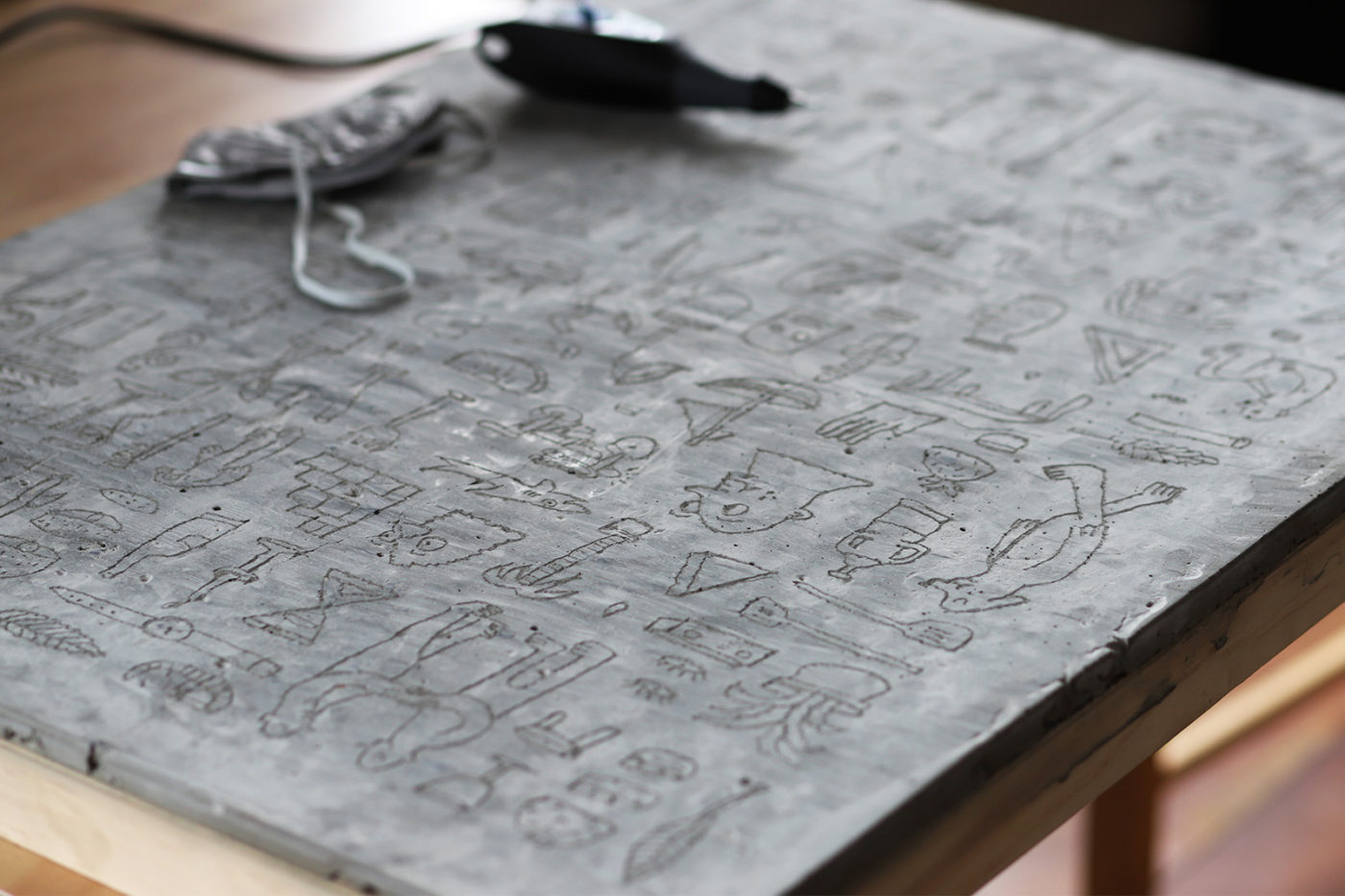 Homage to Hieroglyphics. Hand engraved cement & stone fixed to 760x1015mm wood bed (Sold)