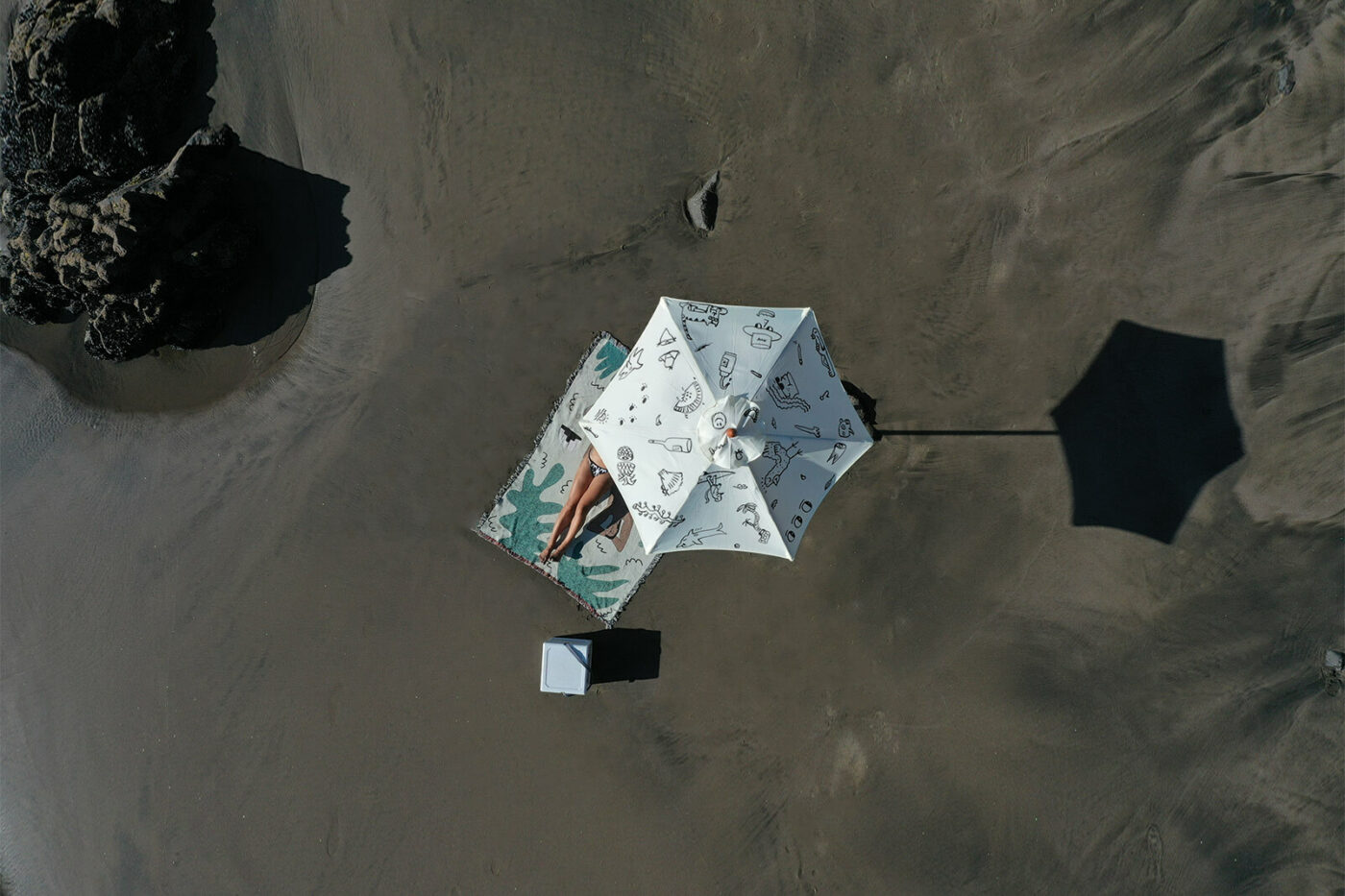 Sun shade, hand-drawn beach umbrella (Muriwai Beach, New Zealand)